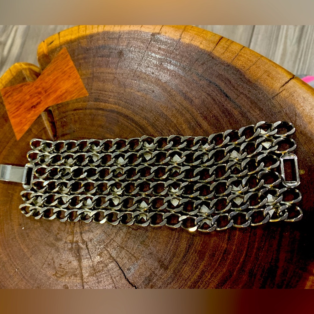 Stainless Steele bracelet.  7 inches long by 2 inches.